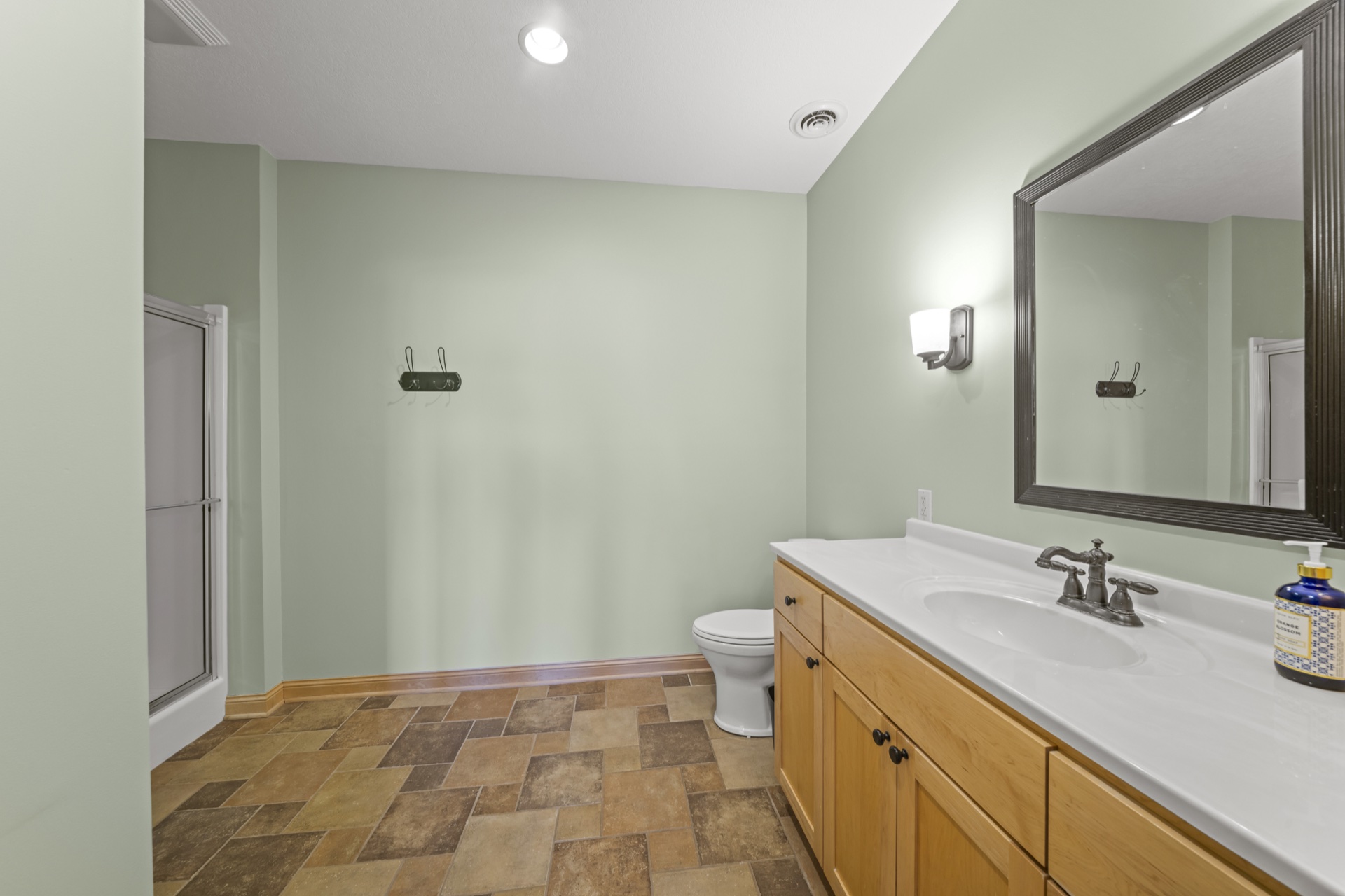 Lower level full bathroom with tub and shower combination