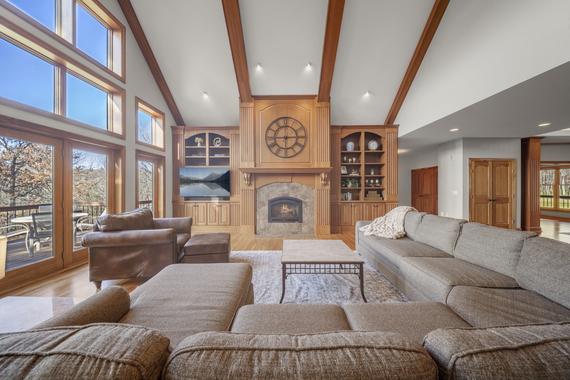 Living room with direct access to wrap-around deck and outdoor seating